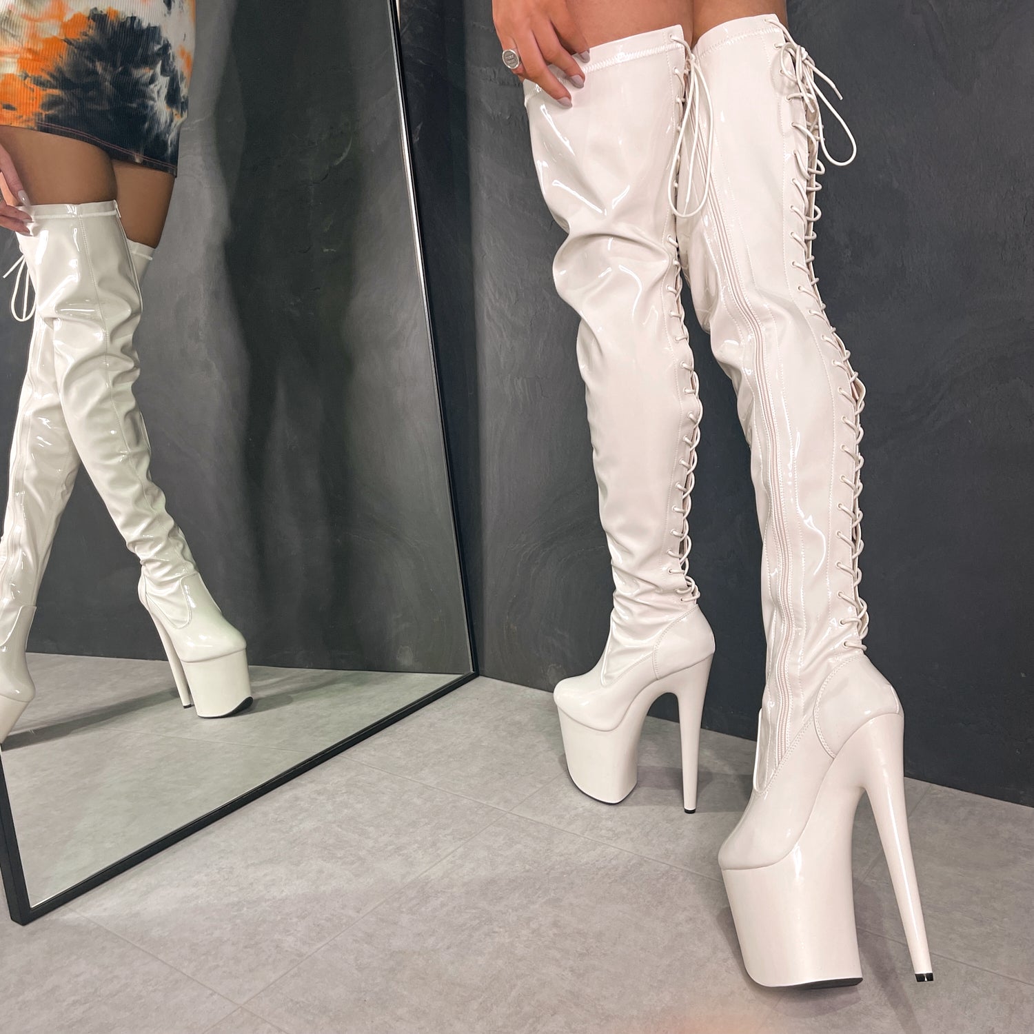 How Many Thigh-High Boots Can You Spot On These VS Angels